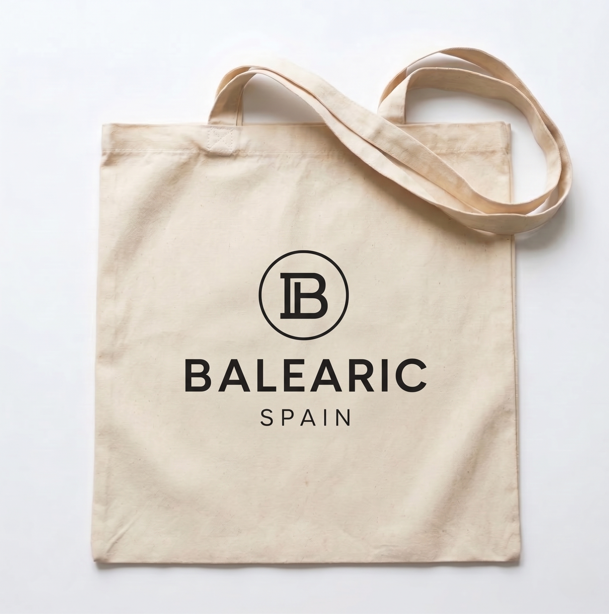 Beige tote bag with 'Balearic Spain' logo on a white background