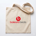 Beige tote bag with 'balearic beats' logo on a white background