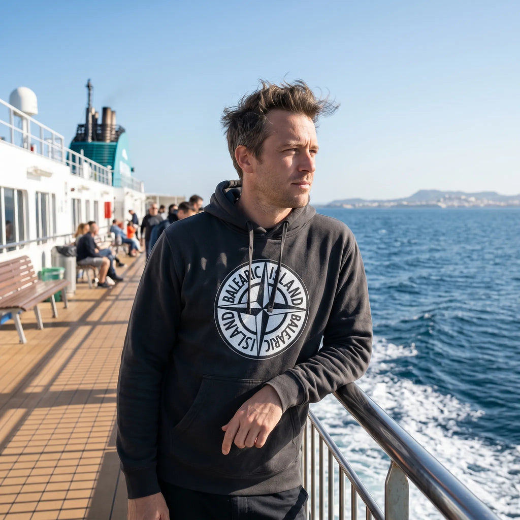 Man wearing Balearic Island Badge hoodie on a ferry