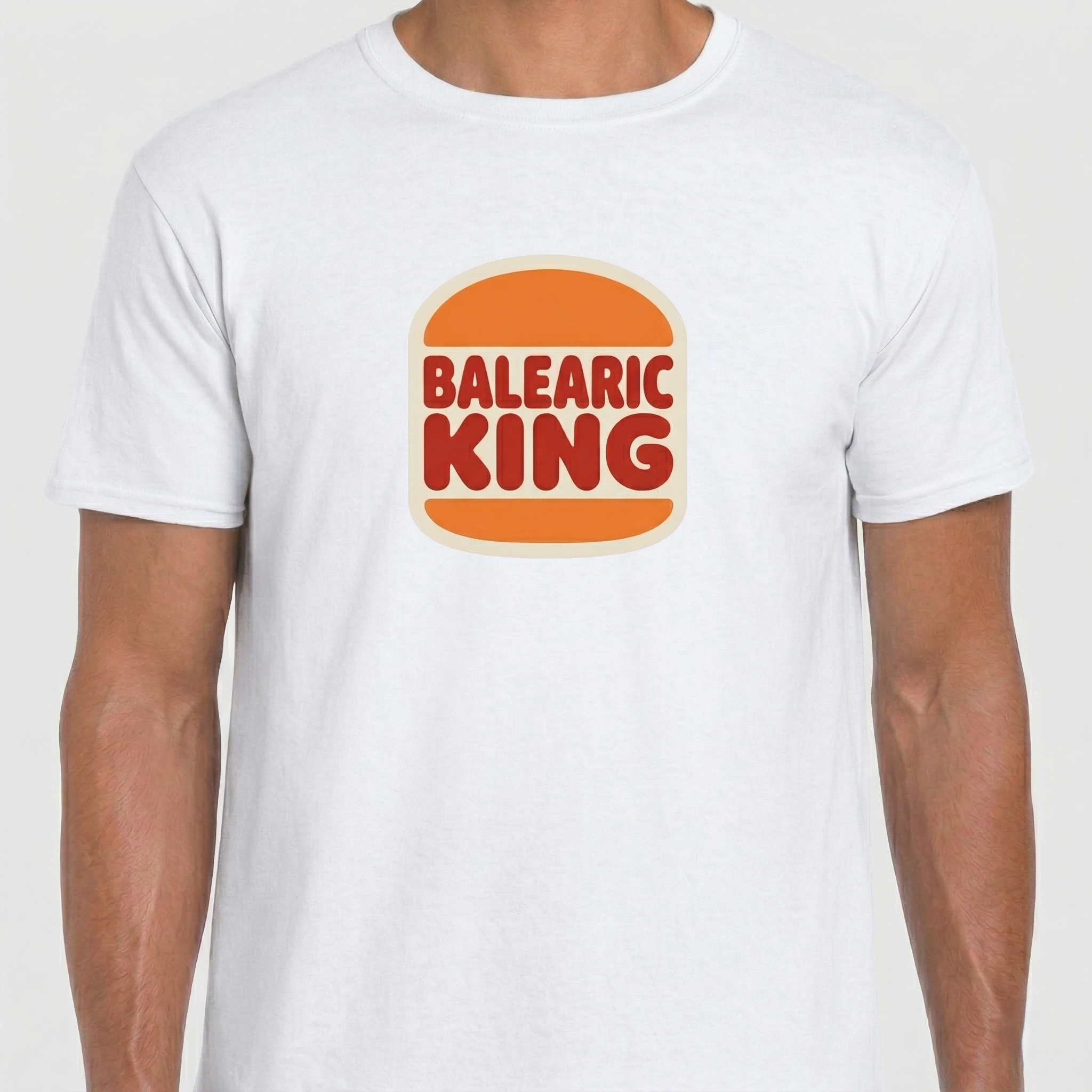Balearic Blend T-shirt: A high-quality product photograph of the white Balearic King T-shirt, showcasing the orange and red retro fast-food style parody logo, centered on the chest.