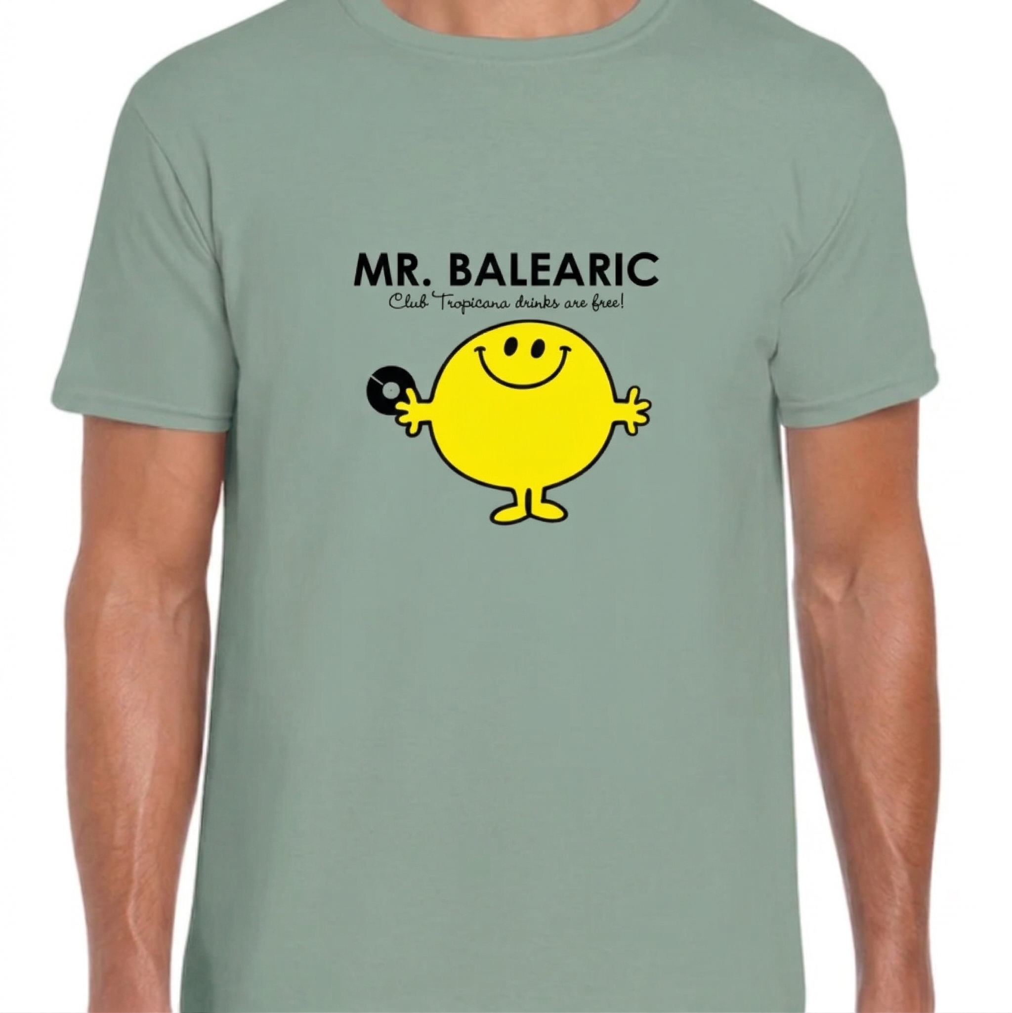 Balearic Blend T-shirt: Man wearing a sage green graphic tee featuring the Mr. Balearic yellow smiley face holding a record and 'Club Tropicana' tagline.