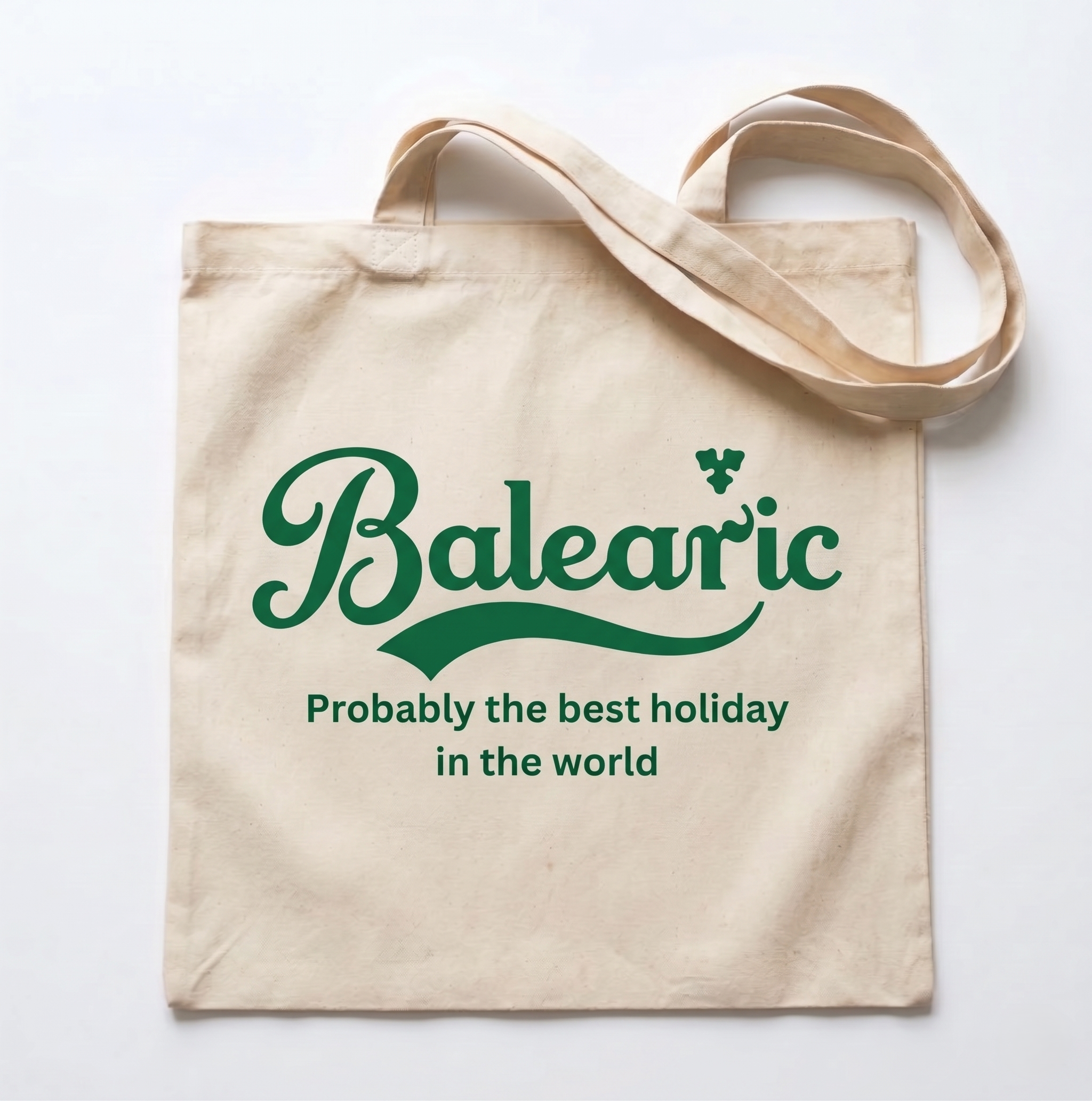 Beige tote bag with green  'Balearic - Probably the best holiday in the world' text on a white background
